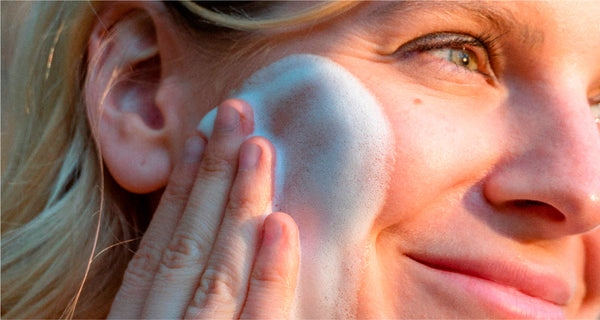 woman using micellar foaming cleanser ATTITUDE